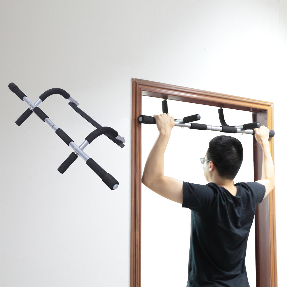 A male model does pullups with the Simple Iron Doorway Pull-Up Bar